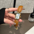 Elegant women's square disc watch with luxury leather strap
