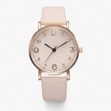 Minimalist round watch with leather strap